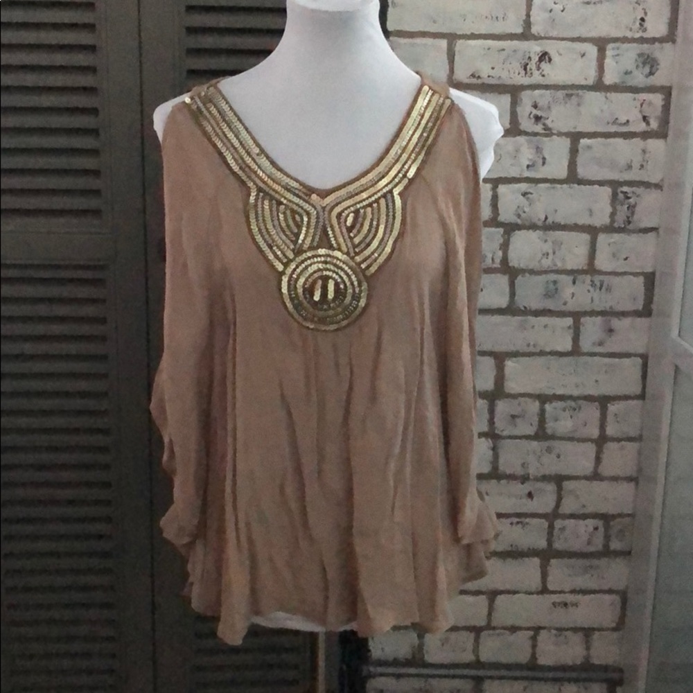 Tan cold shoulder blouse with sequined accents